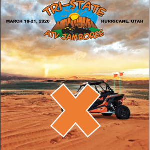 atv on sand with orange x