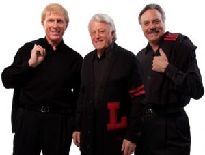 Three men dressed in black